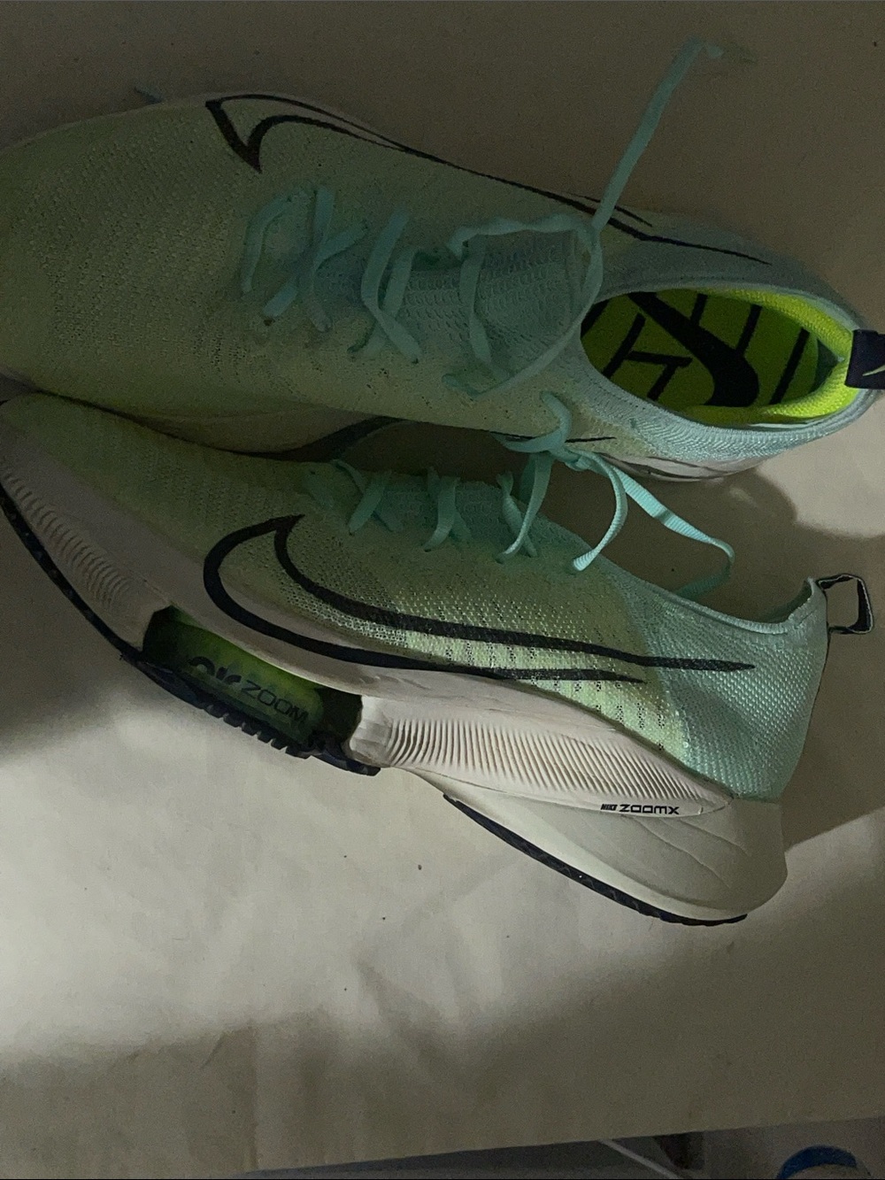 Nike Air Zoom Tempo NEXT% Flyknit sneakers in the Barely Volt/Mint Foam colorway - Picture 3 of 9
